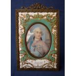 Gilt and enamel framed miniature head an