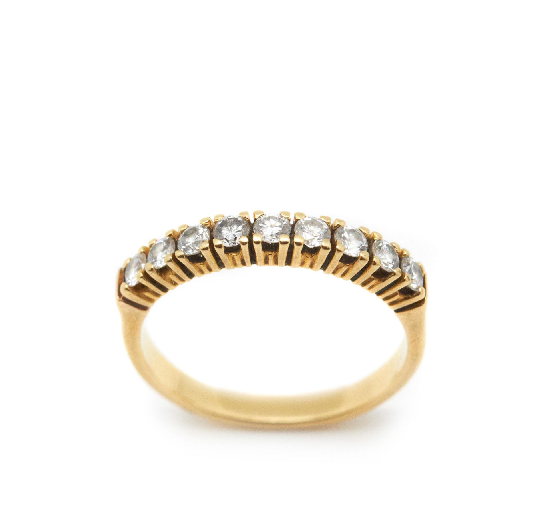 HALF ETERNITY RING. Montura en oro y diamantes talla brillante, 0,45 ct. aprox. 2,80 gr.  Starting