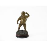 GROTESQUE FIGURE, EARLY 20TH CENTURY "Personaje grotesco", en bronce dorado sobre base en madera, 20