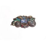 CATALAN BROOCH, CIRCA 1930 Montura en plata, un diamante talla rosa, piedras y esmaltes