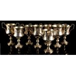 Property of a deceased estate - eight matching Chinese silver two-handled trophy cups, early