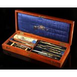Property of a lady - a Stanley mahogany cased set of drawing instruments, including a folding