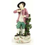 Property of a lady - a Derby style figure of a vintner, restorations, 7.4ins. (18.8cms.) high (see