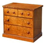 Property of a lady - a Victorian figured walnut chest of two short & two long drawers with turned