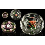 A faceted glass posy paperweight, probably St. Louis & mid C19th, cut with concentric circles,