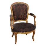 Property of a lady - a C19th Louis XV style giltwood open armchair (see illustration).