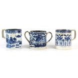 Property of a lady - a group of three large early C19th pearlware blue & white mugs, the tallest 5.