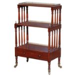 Property of a deceased estate - an early C19th George IV mahogany three-tier whatnot, with brass