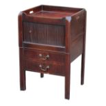 Property of a gentleman - a George III mahogany tray-top commode, with tambour shutter (see