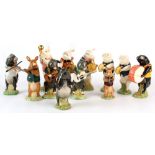 Property of a deceased estate - a set of twelve Beswick  pig band players, each with its original