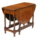 Property of a lady - a Victorian walnut oval topped gate-leg table with end drawer & barleytwist