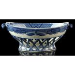 Property of a deceased estate - an early C19th pearlware blue & white two-handled oval basket,