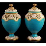 A pair of mid C19th Minton turquoise ground pot pourri vases, painted with trailing pink roses