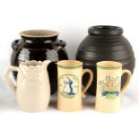 Property of a lady - a Clarice Cliff buff coloured jug; together with two Ashtead Potters steins;