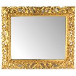 Property of a lady - an early C20th Florentine carved giltwood rectangular framed wall mirror, 30.