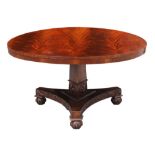 Property of a lady - an early C19th William IV flame mahogany circular tilt-top breakfast table on