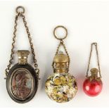 Property of a lady - a group of three assorted scent phials including carved abalone shell warrior's