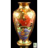 A Wedgwood fairyland lustre baluster vase, designed by Daisy Makeig-Jones, decorated in the Willow