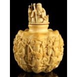 A late C19th / early C20th Chinese carved ivory snuff bottle, of lobed octagonal form carved with