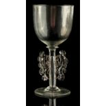 A facon de Venise drinking glass, 19th century, with folded foot, 4.3ins. (11cms.) high (see