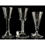 A small private collection of drinking glasses - a wine glass with frosted & multi series air