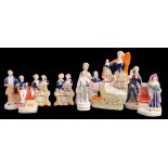 The Martin-Smith Collection of Victorian Staffordshire figures - Queen Victoria standing beside a