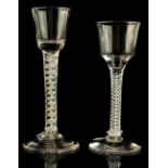 A small private collection of drinking glasses - a cordial glass with double series opaque twist