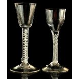A small private collection of drinking glasses - a wine glass with opaque twist stem & dimpled bowl,