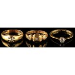 Property of a deceased estate - three 18ct gold diamond rings including a solitaire with brilliant