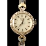 Property of a lady - a lady's Tudor Royal 9ct white gold cased cocktail watch with diamond bezel &