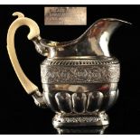 Property of a deceased estate - a 19th century Russian silver milk jug with carved ivory handle,