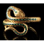 A Continental 18ct gold snake bangle or hinged bracelet, set with blue enamel & cabochon green paste