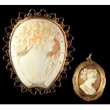 Property of a gentleman - a horseshoe shaped shell cameo brooch depicting a maiden, the shell