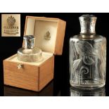 Property of a deceased estate - FABERGE - a silver topped clear glass scent bottle by Faberge, the