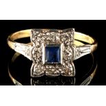 An 18ct gold sapphire & diamond ring, the shaped square setting with rectangular cut sapphire within