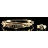 Property of a deceased estate - a late 19th / early 20th century 9ct gold hinged bracelet set with