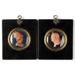 Property of a lady - a pair of 19th century  wax relief profile busts of classical figures, one a