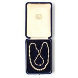 Property of a deceased estate - a boxed Shimamoto graduated cultured pearl single strand necklace,