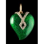 A late 19th / early 20th century green guilloche enamel faced heart shaped locket pendant, set