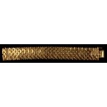 Property of a lady - a heavy 18ct gold scale pattern bracelet, 7.6ins. (19.3cms.) long,