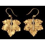 A pair of 18ct gold leaf shaped earrings, each set with four small diamonds, approximately 6