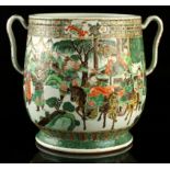 A Chinese famille verte jar, 19th century, of unusual two-handled baluster form, painted with