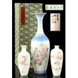 Two Chinese eggshell vases, mid / late 20th century, each painted with a bird on blossoming