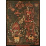 A thanka or thangka, 18th / 19th century, the painting 21.25 by 15.35ins. (54 by 39cms.), mounted in