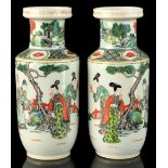 A pair of Chinese famille verte rouleau vases, late 19th / early 20th century, each painted with