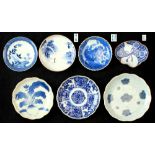 Seven various Japanese blue & white dishes, mostly 19th century, the largest 9.2ins. (23.4cms.) dia.