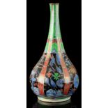 A private collection of Oriental ceramics & works of art - a Chinese bottle vase with 'clobbered'