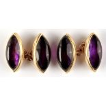 A pair of 9ct gold & oval cabochon amethyst cufflinks (2) (see illustration).