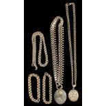 A bag containing assorted silver & white metal chains & lockets including a Victorian silver locket,