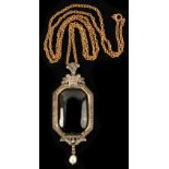 A large garnet pearl & diamond pendant, the rounded rectangular cabochon garnet approximately 1.